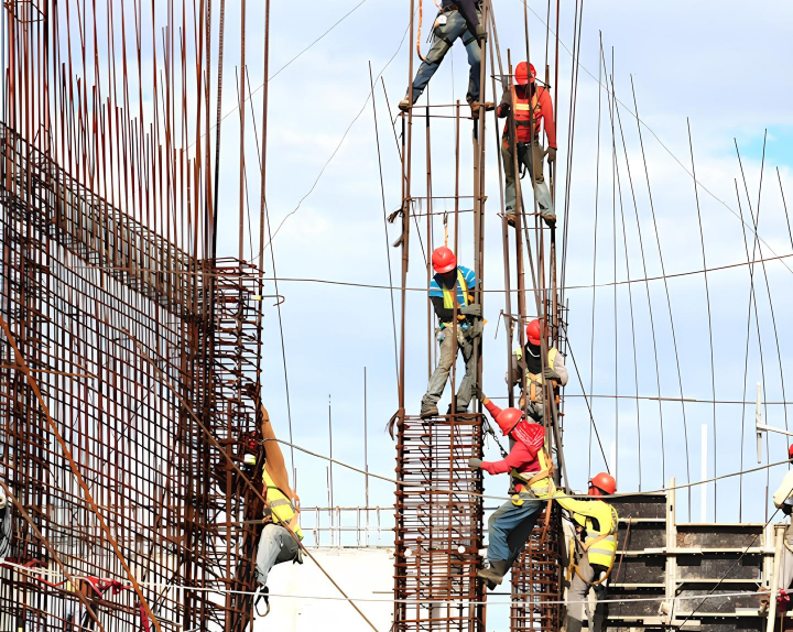 Construction workers on scaffolding